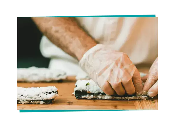 Employee making sushi